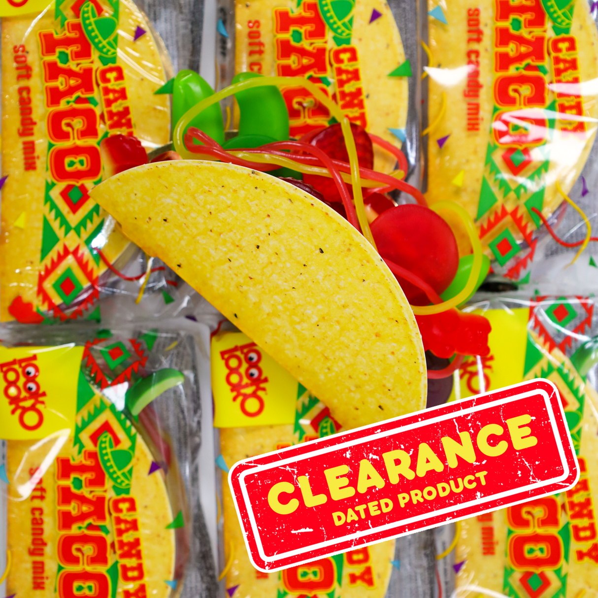 Taco-shaped candy with 'Clearance Dated Product' stamp against a blurred background of similar candy packages.